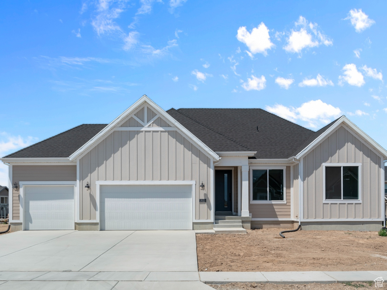 View of front of house with a garage