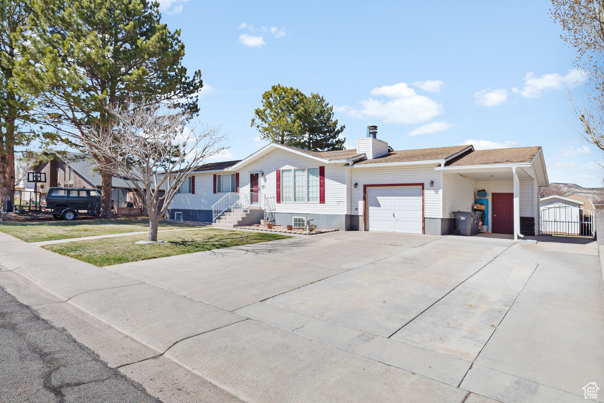 View of front facade featuring a garage