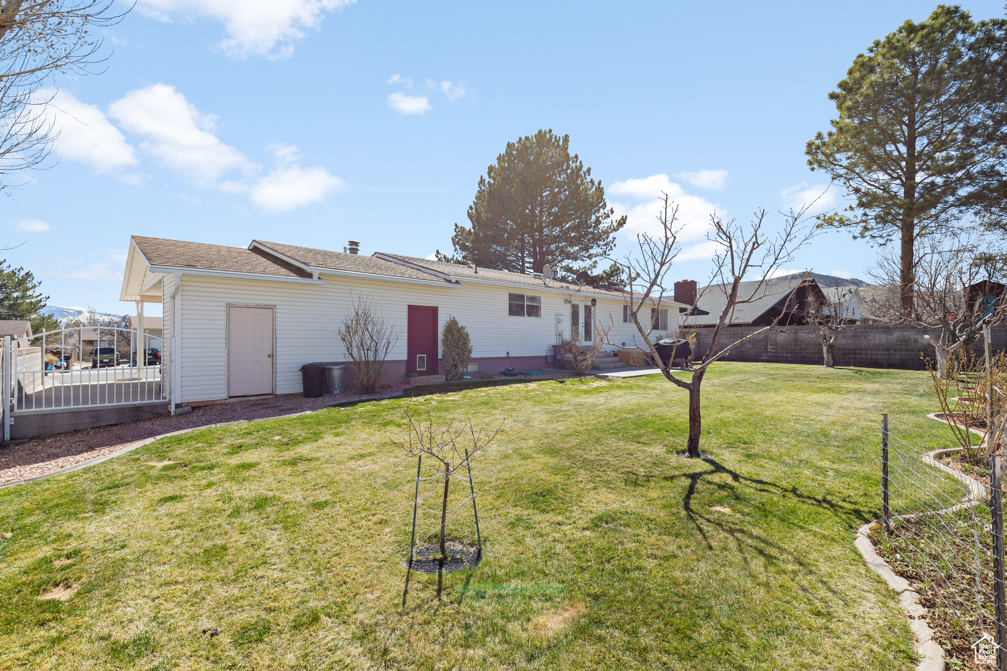 Exterior space featuring a yard