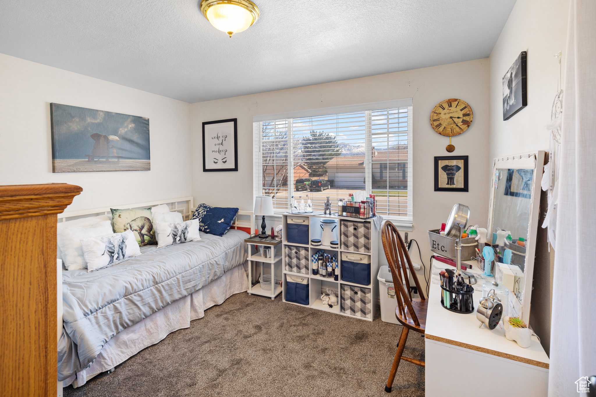 Bedroom featuring dark carpet