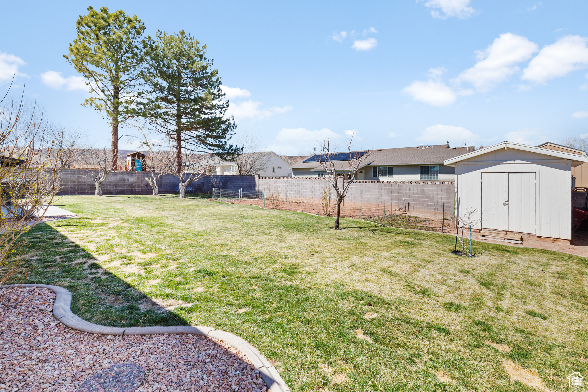 View of yard with a shed