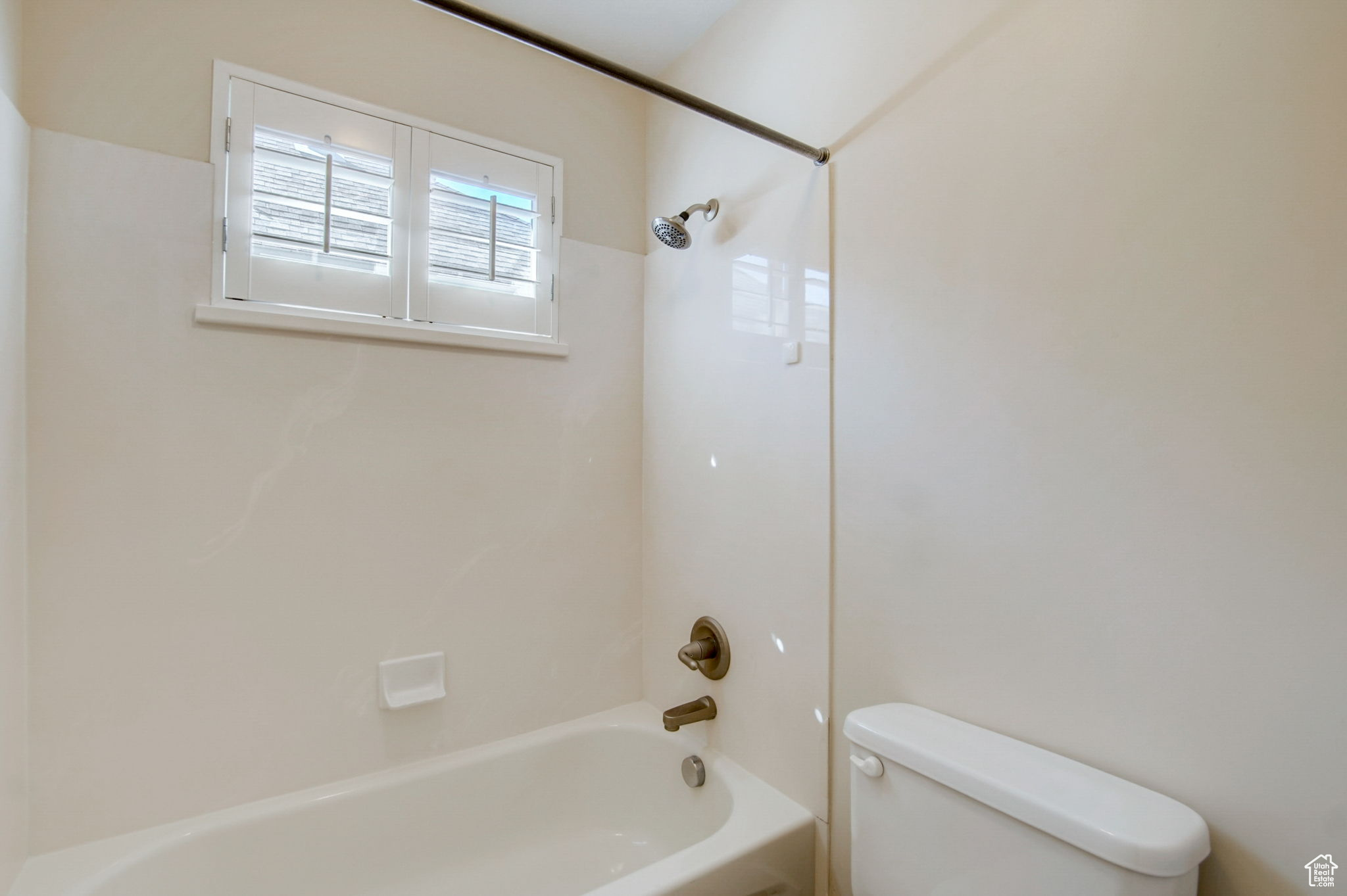 Bathroom with  shower combination and toilet