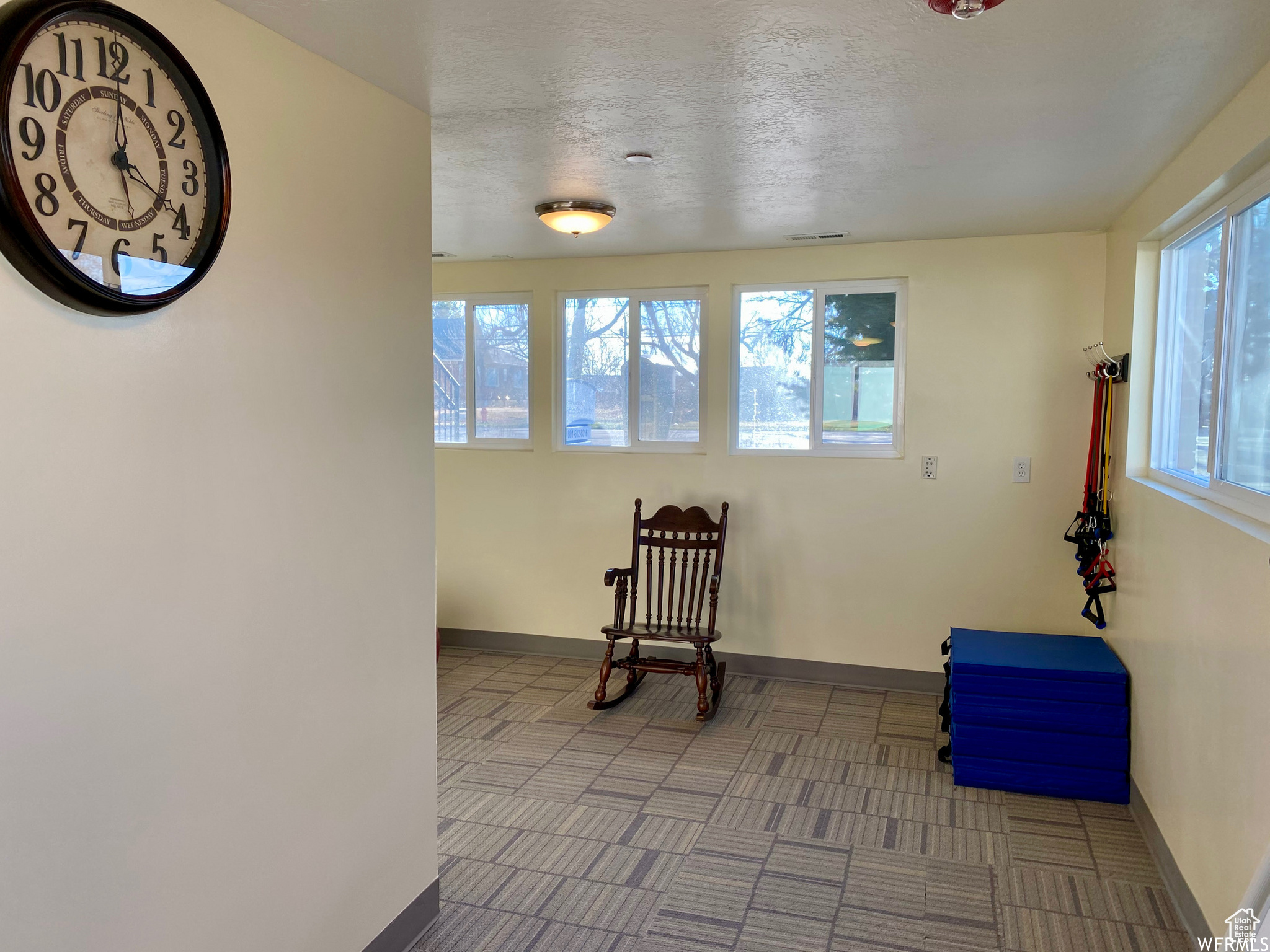 Living area featuring light tile flooring