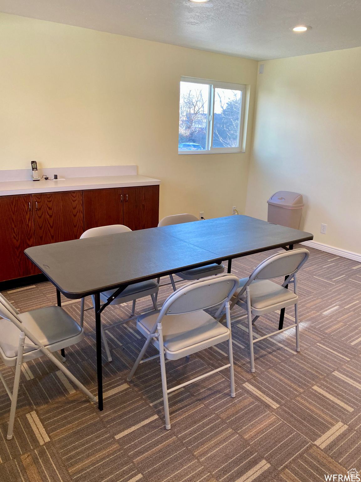 View of carpeted dining room