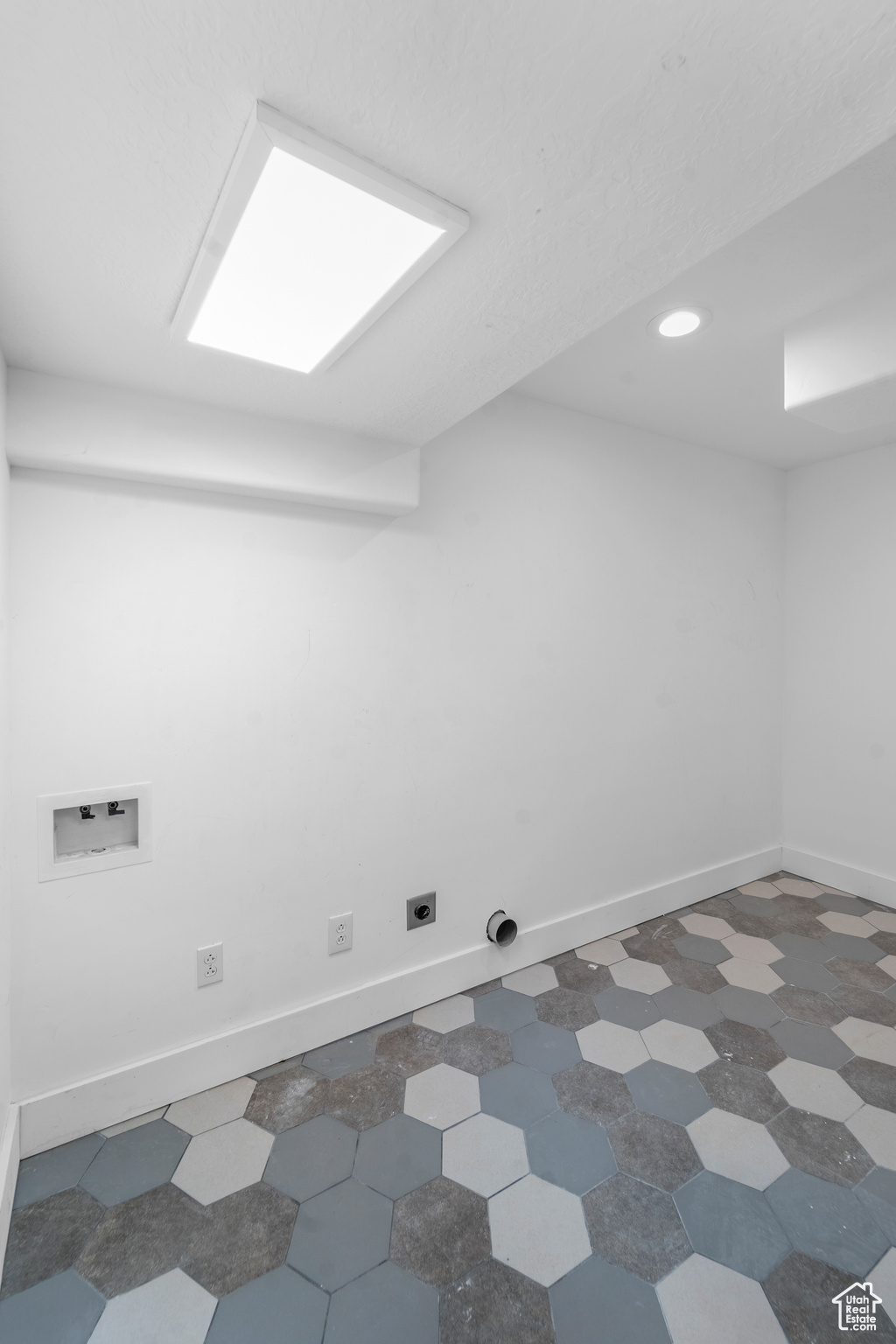 Interior space featuring dark tile flooring
