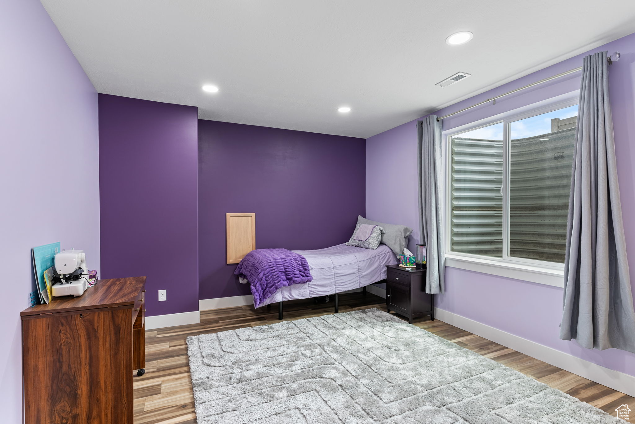 Bedroom featuring light wood-type flooring