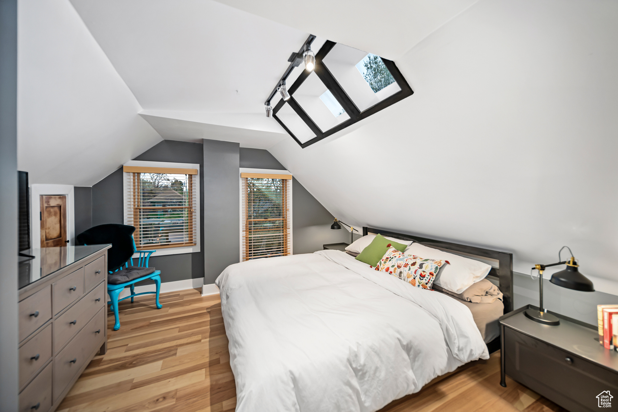 Bedroom 1, Lofted Ceiling w/ Skylights, Track Lighting, Wood Blinds, Wood Floors