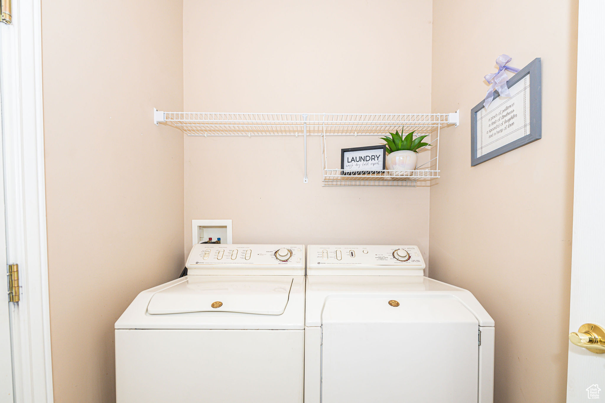 Laundry room with separate washer and dryer and washer hookup