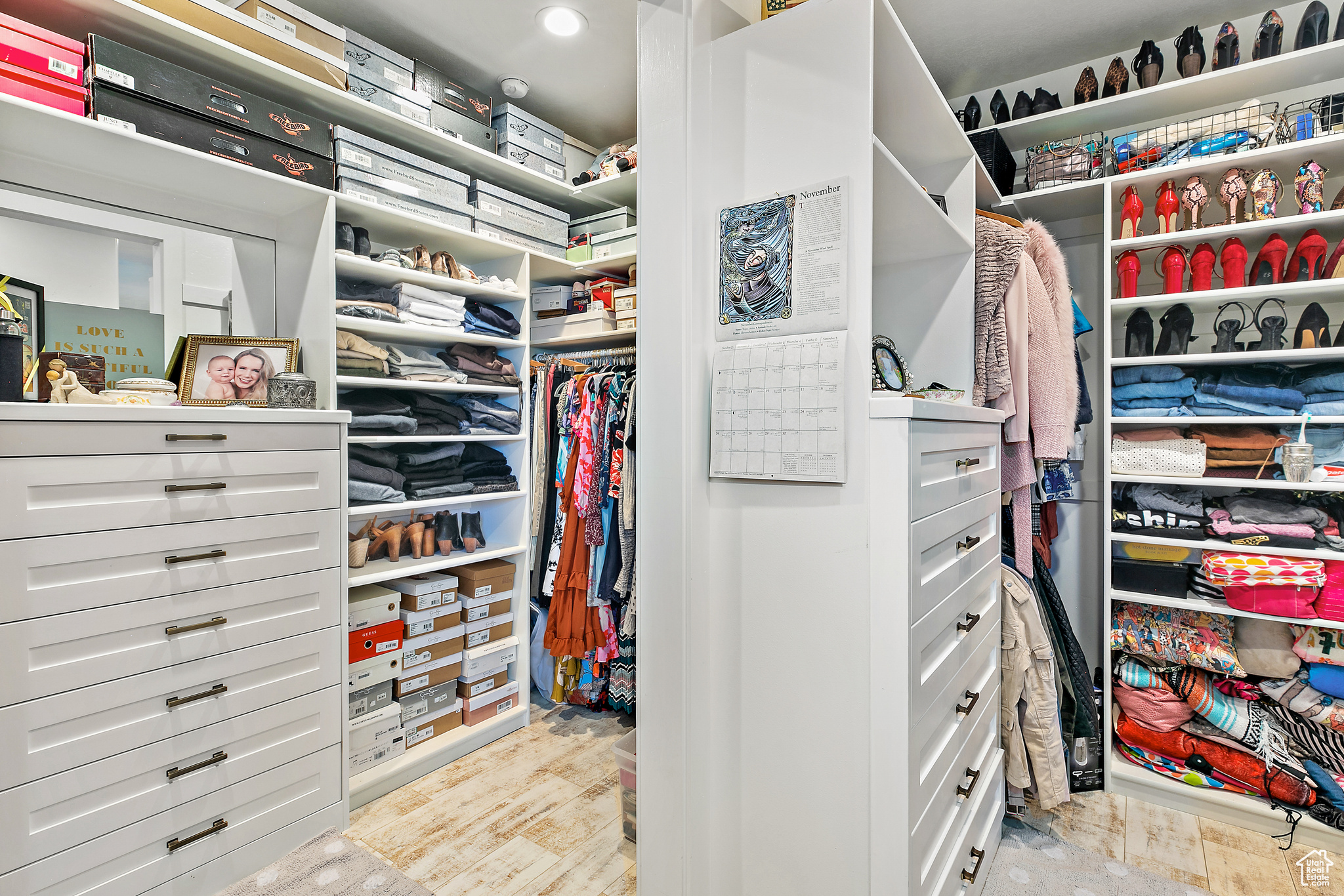 Primary Walk in closet with built-in dressers