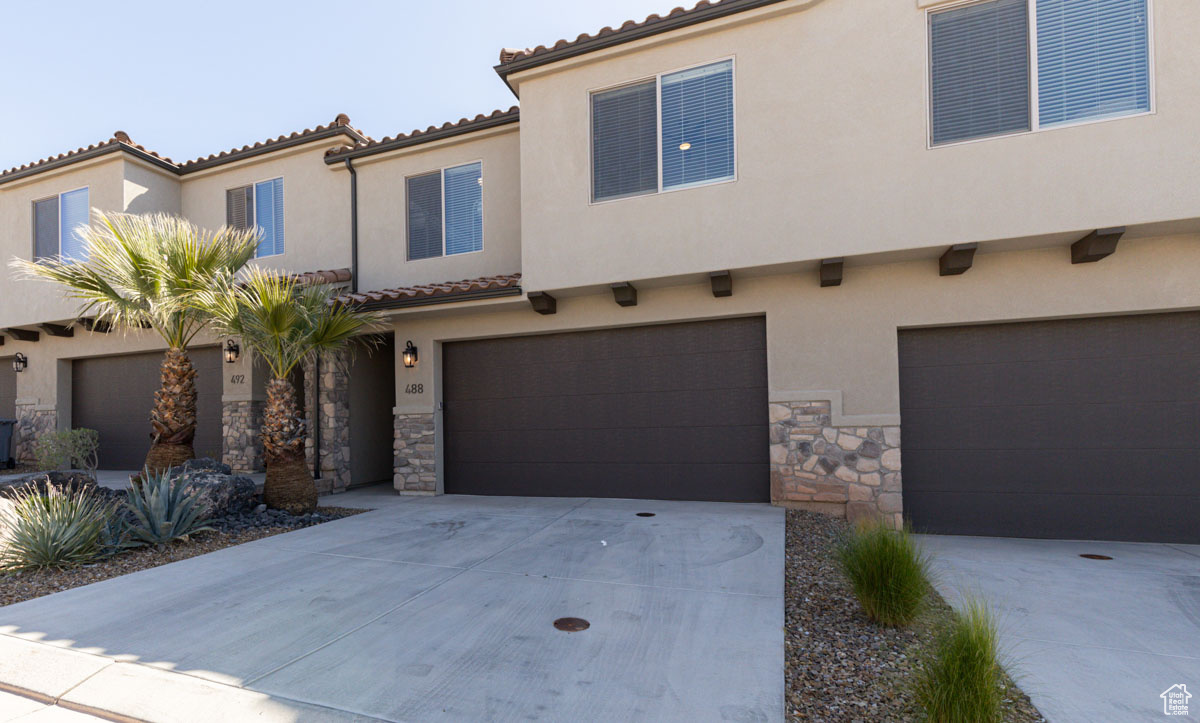 View of front of property with a garage