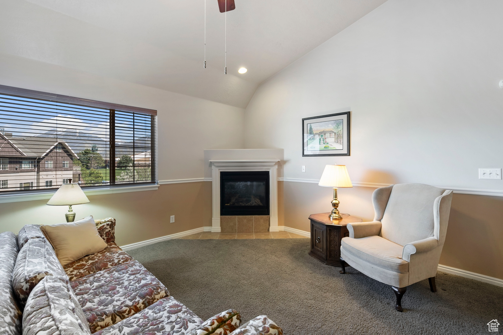 w/ mountain views, gas fireplace and vaulted ceiling