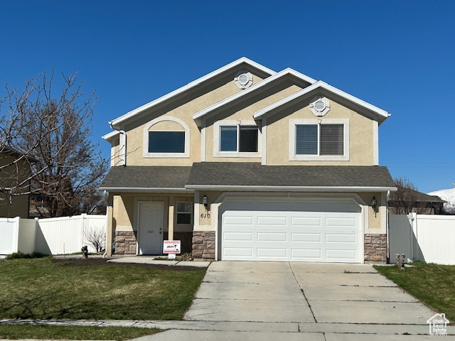 Craftsman-style home with a garage