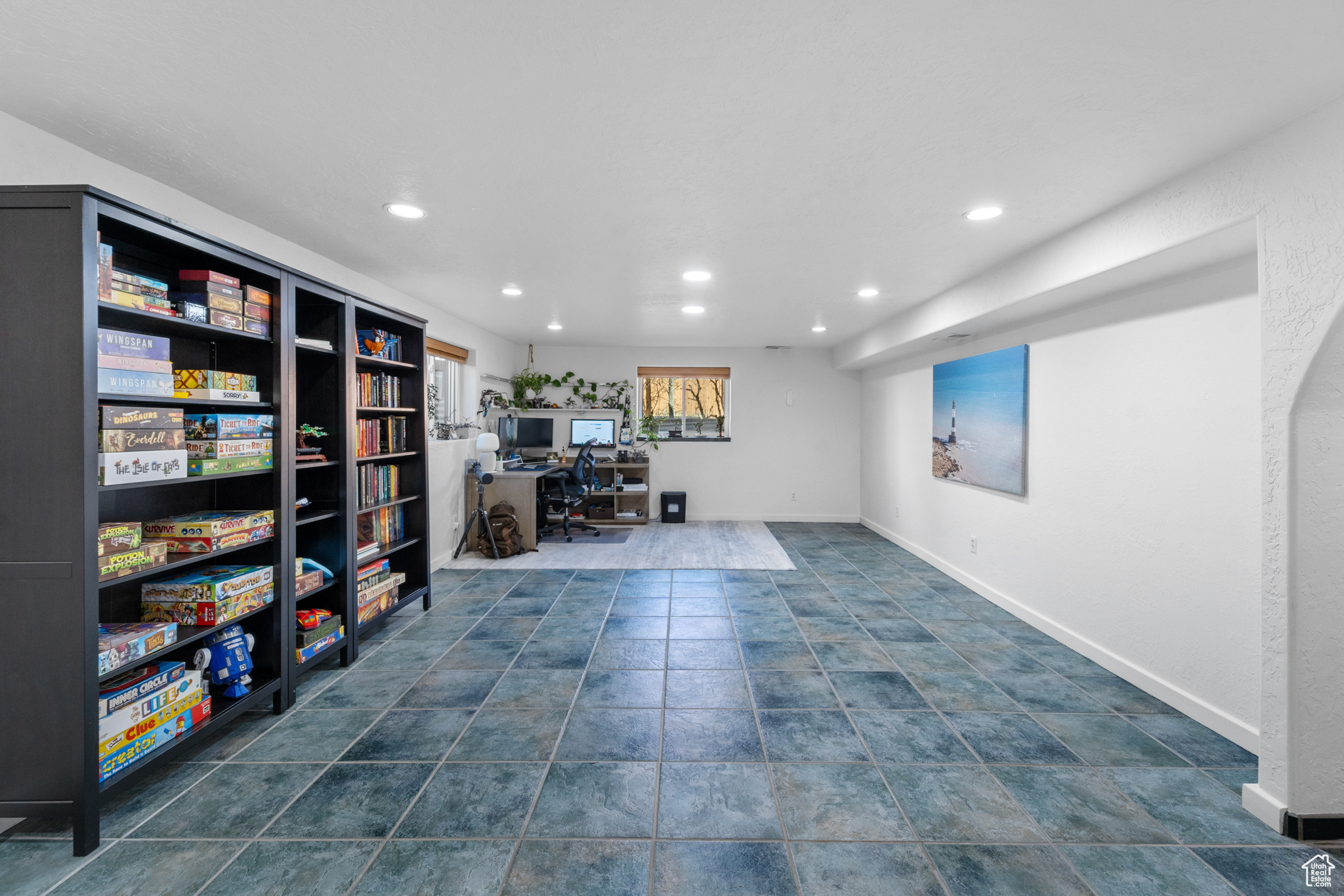 Second family or game room with plenty of light and a wet bar area. Lots of space for whatever you will need :)