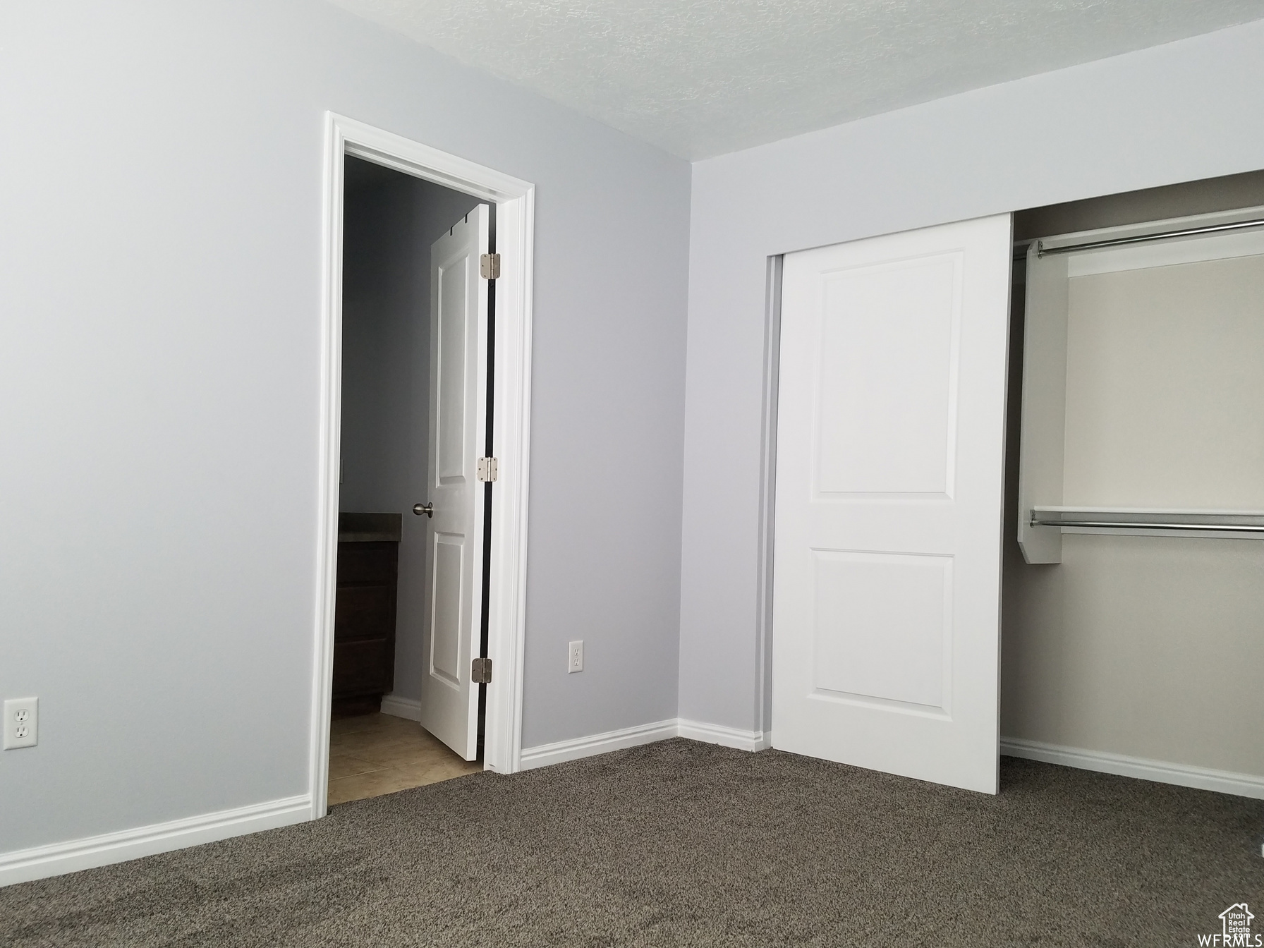 View of Guest Bedroom with Closet & Bathroom