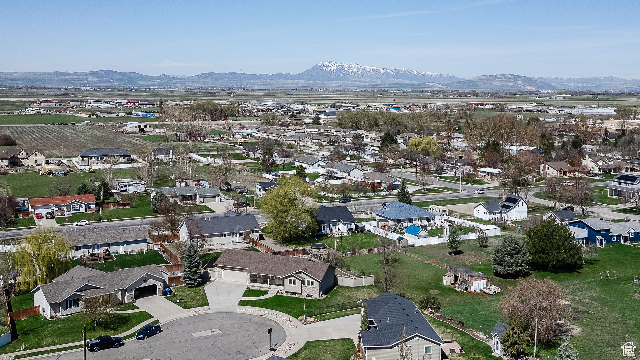 Birds eye view of property, with views of the Wellsville Mountain Range.