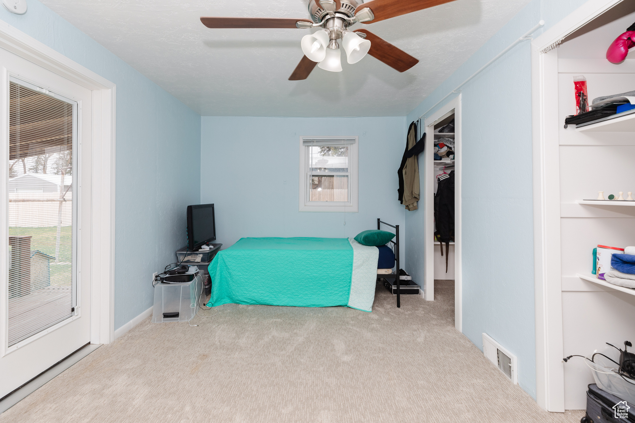 bedroom 2 with french doors out to deck