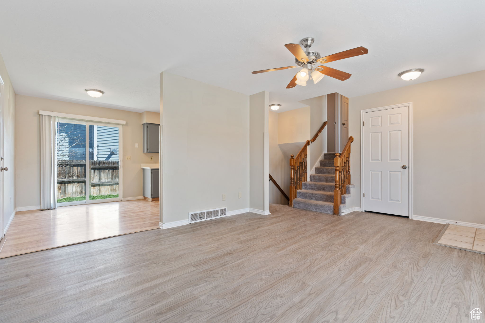 Interior space featuring ceiling fan and light hardwood / wood-style floors