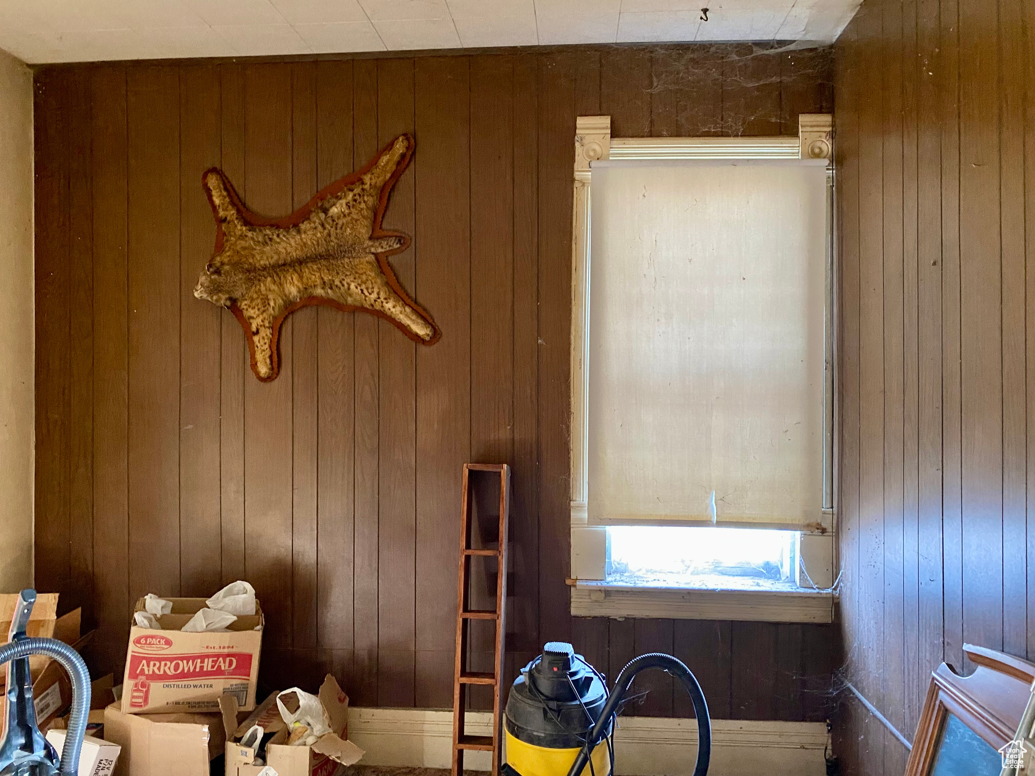 Interior space featuring wood walls