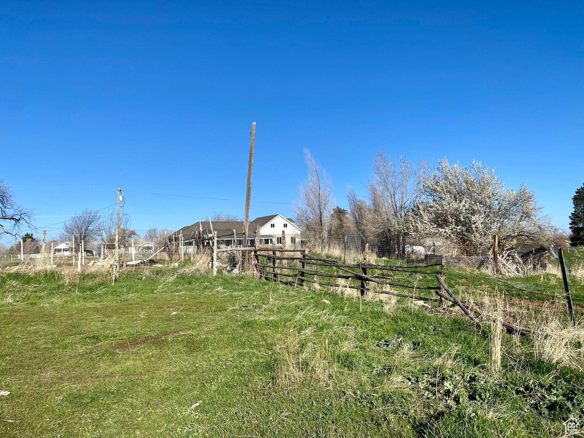 View of yard with a rural view