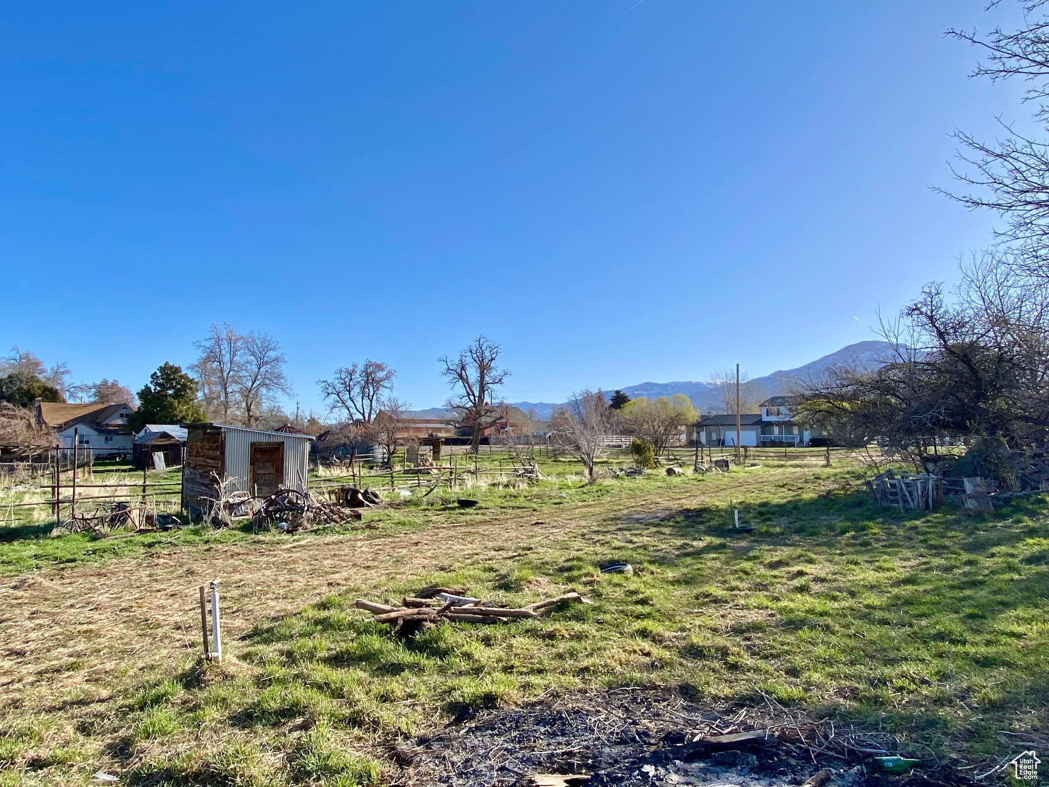 View of yard with a mountain view and a rural view