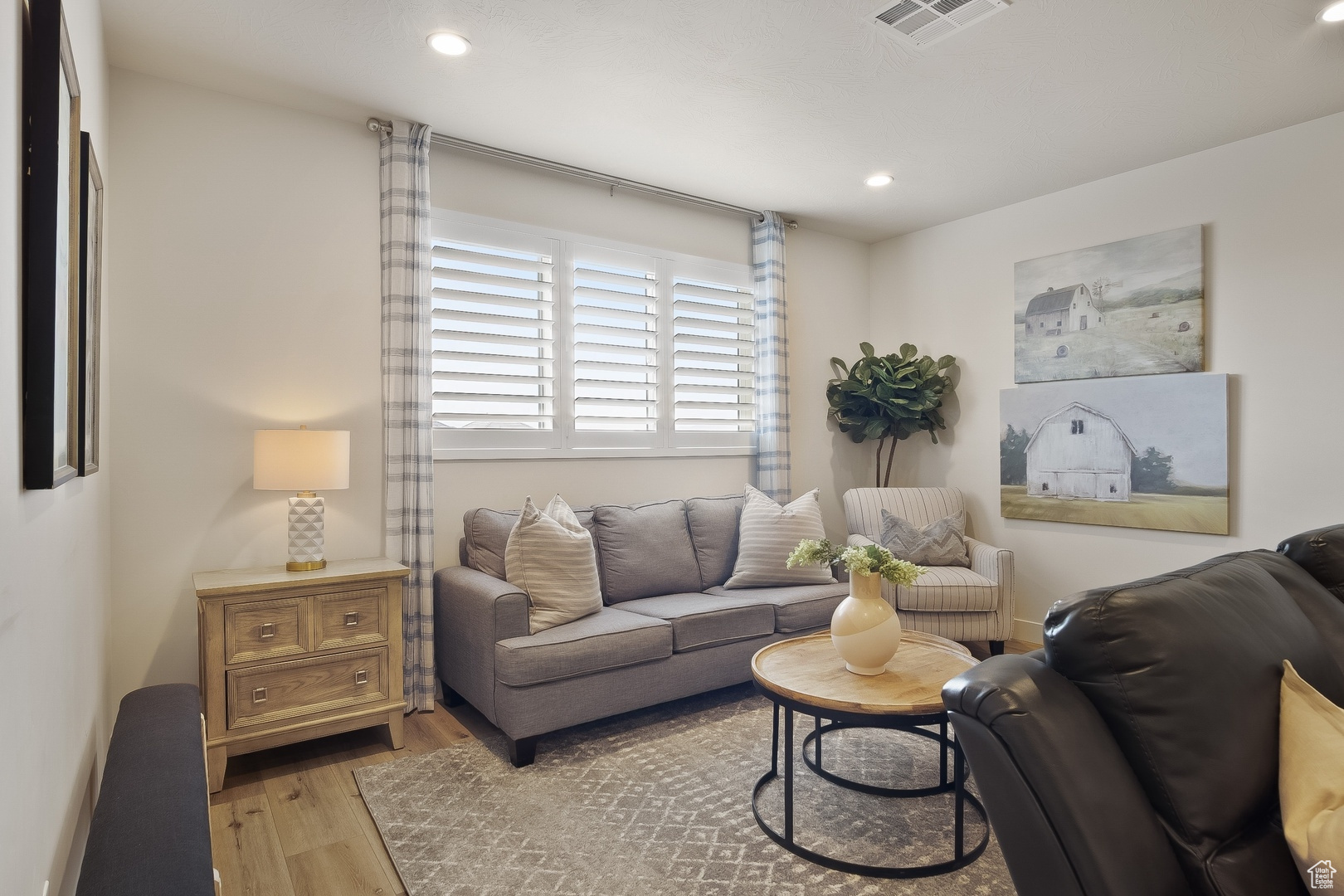 Living room featuring light hardwood / wood-style flooring