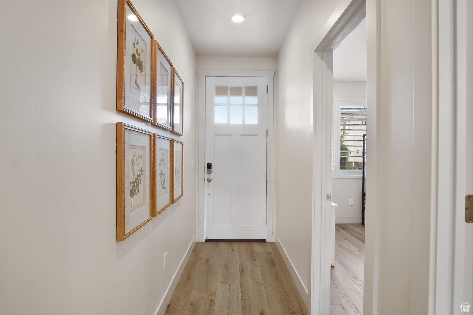 Entryway with light wood-type flooring