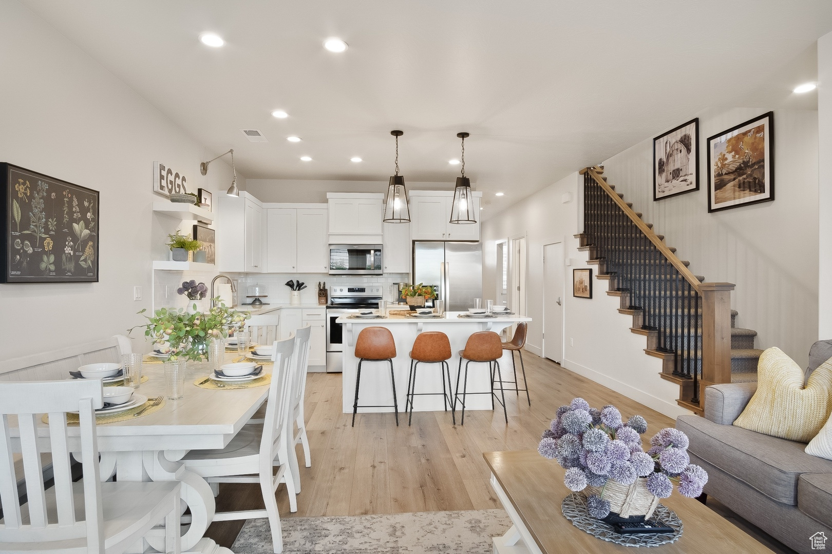 Dining area featuring light hardwood / wood-style flooring and sink