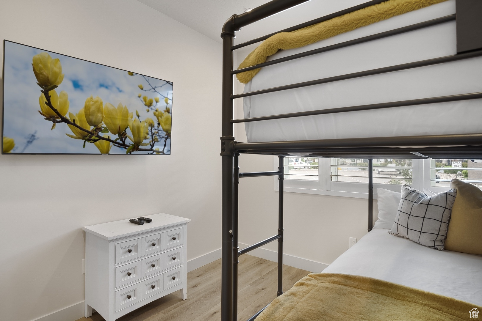 Bedroom featuring light wood-type flooring