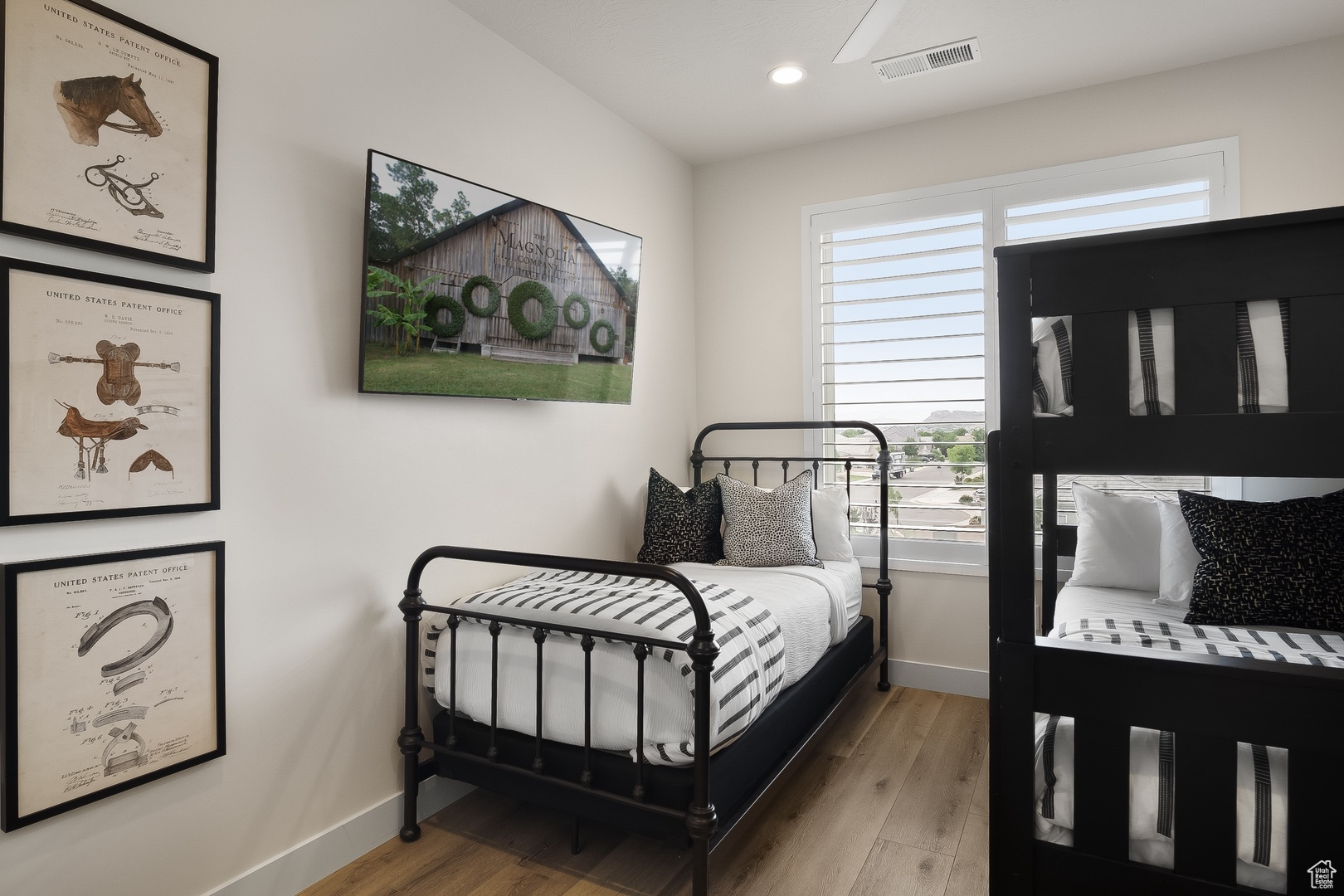 Bedroom with light wood-type flooring