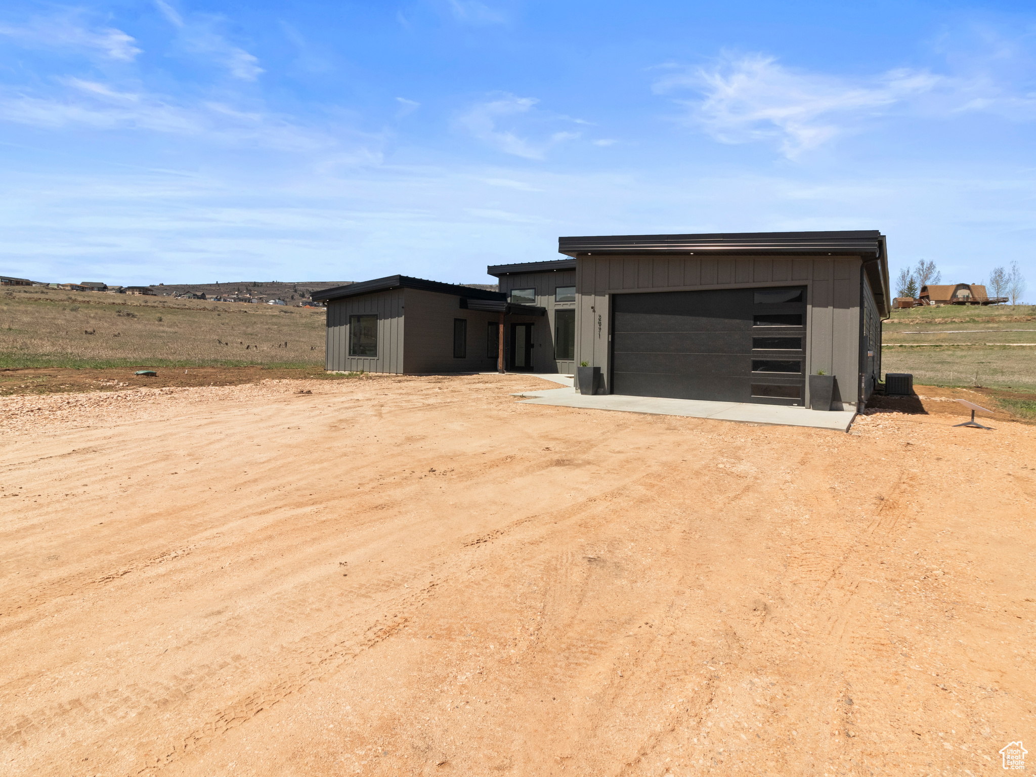 View of front facade with a garage