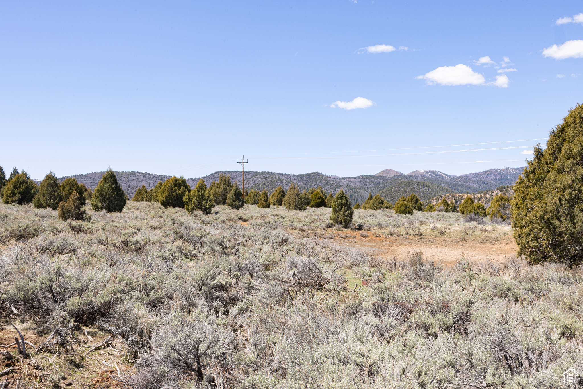 Property view of mountains featuring a rural view