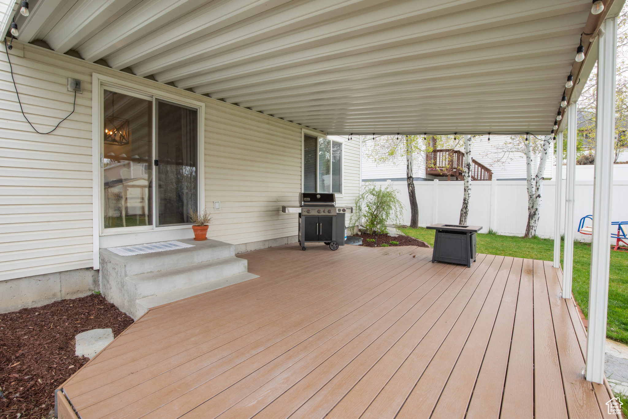 Deck featuring area for grilling