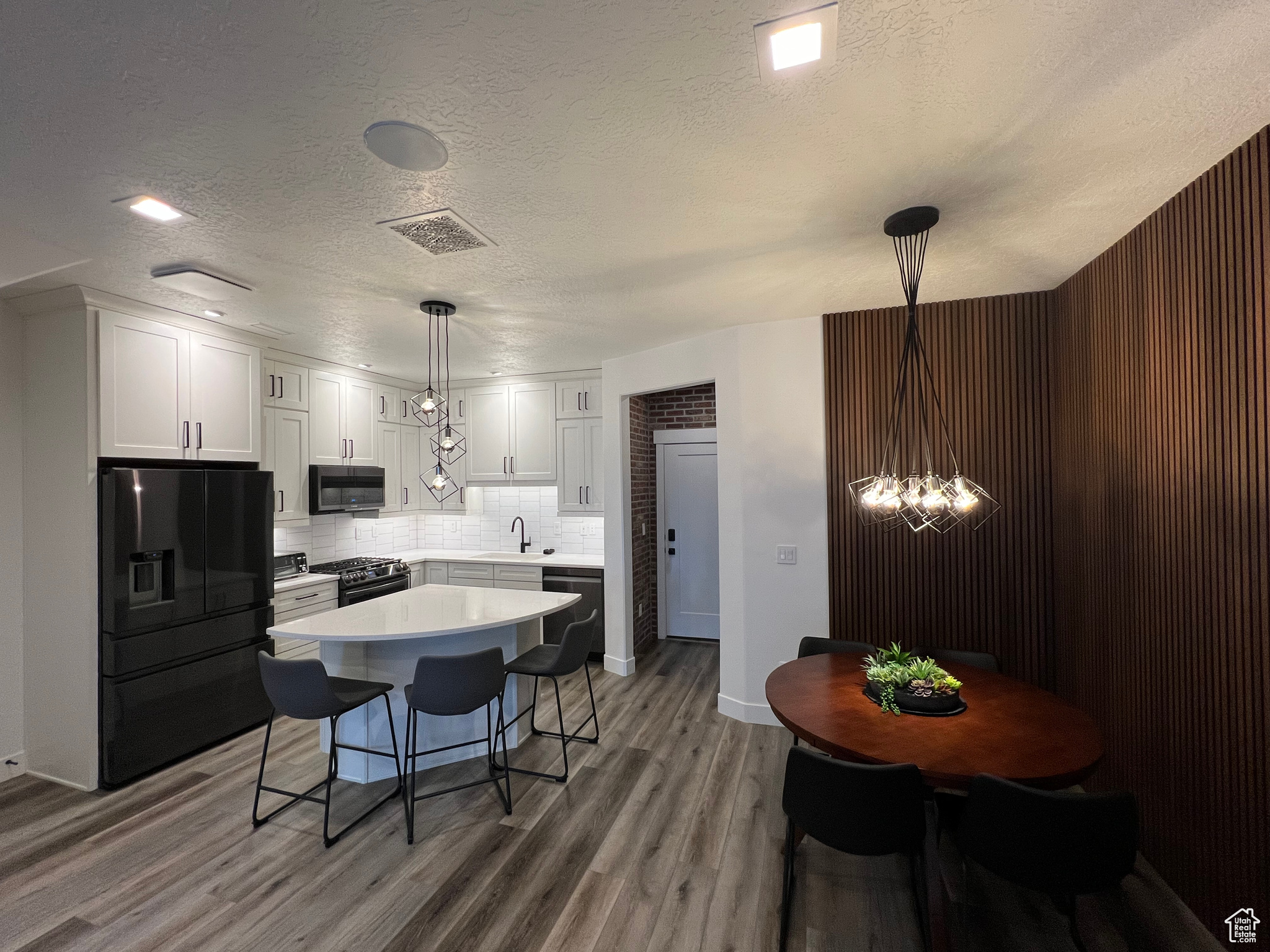 Custom dining table with decorative wood paneling