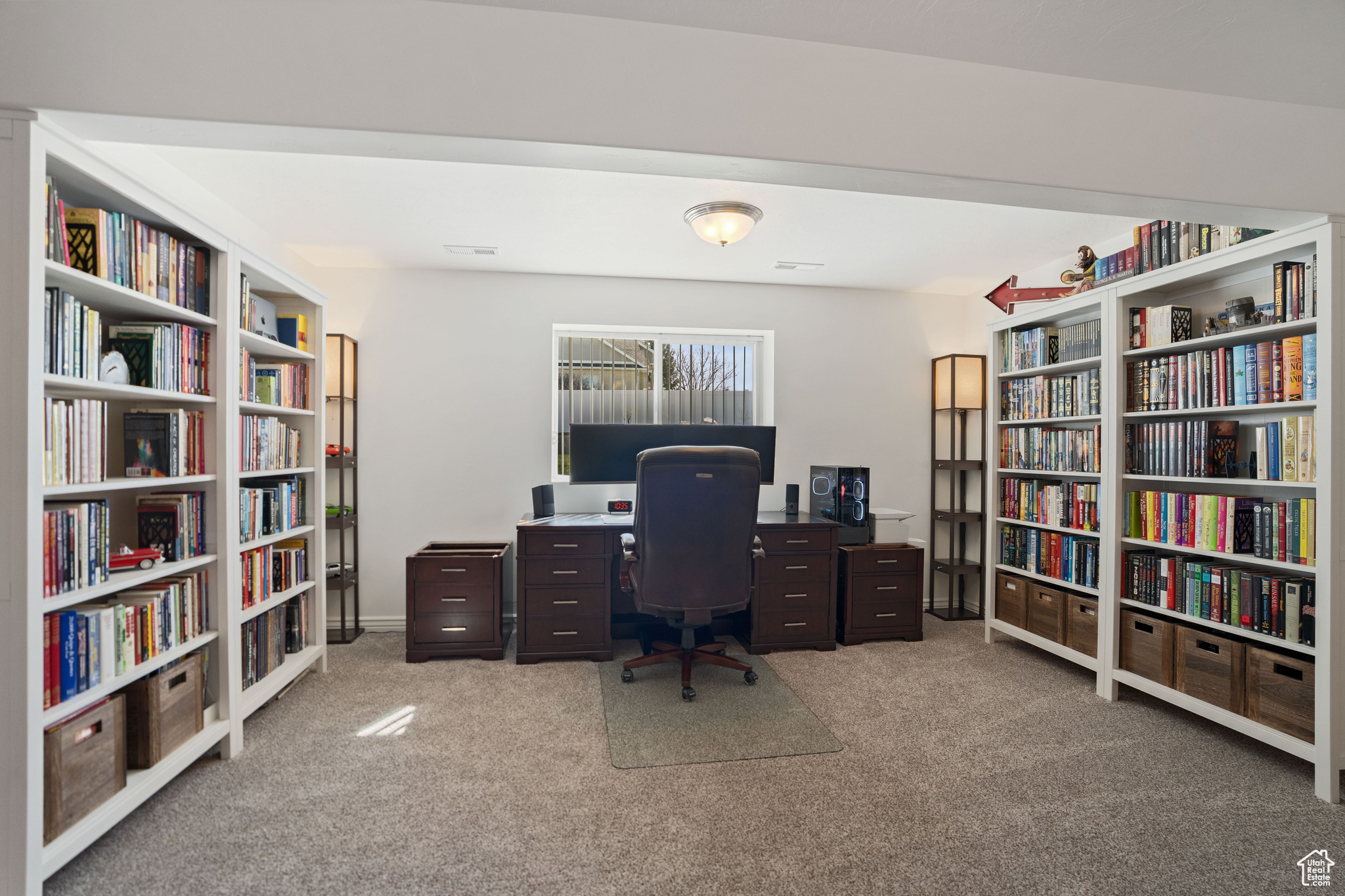 Office featuring light carpet