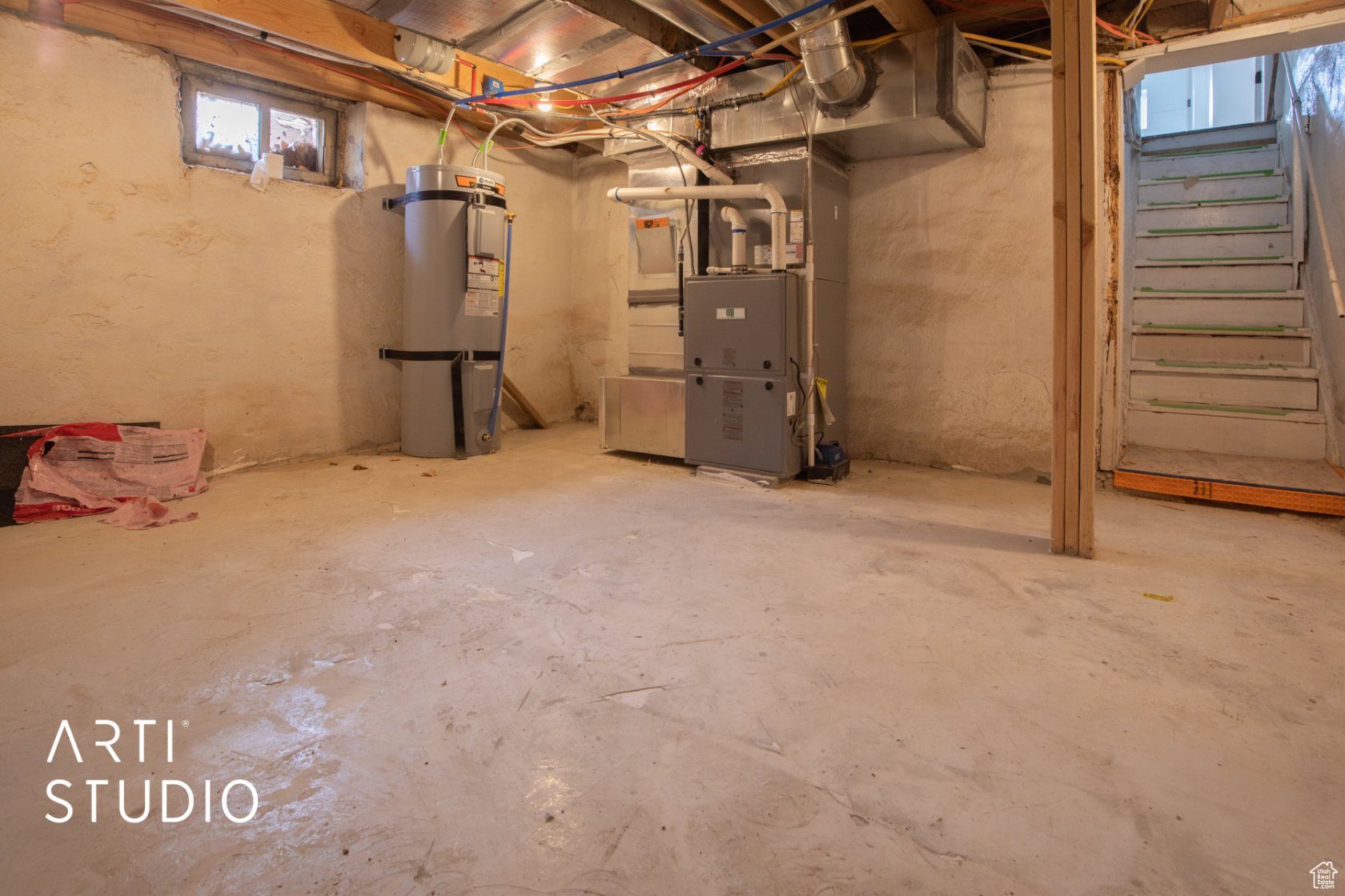 Basement with water heater and heating utilities
