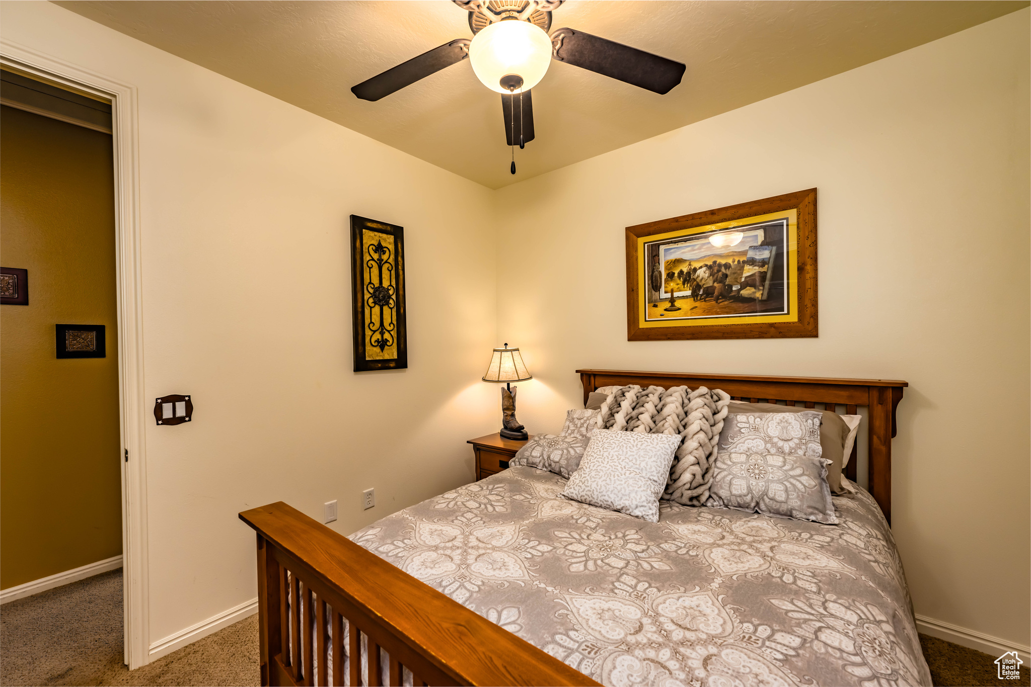 Carpeted bedroom 3 featuring ceiling fan