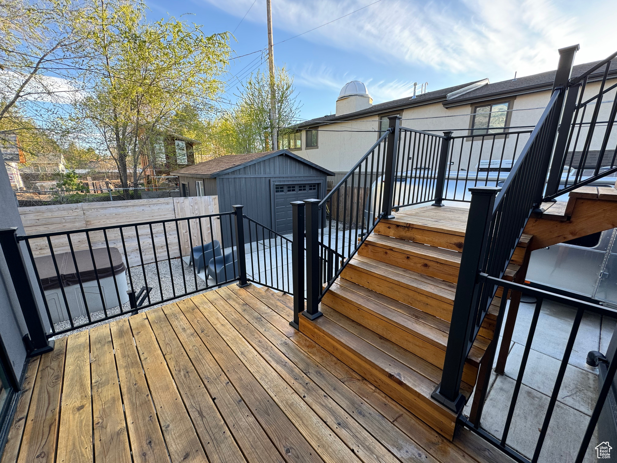 Deck featuring an outdoor structure