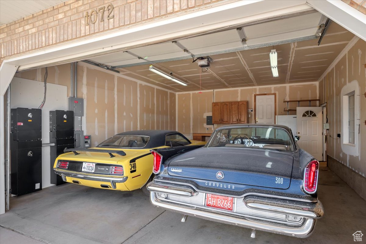 Oversized 2 car garage (21'x27') with a garage door opener