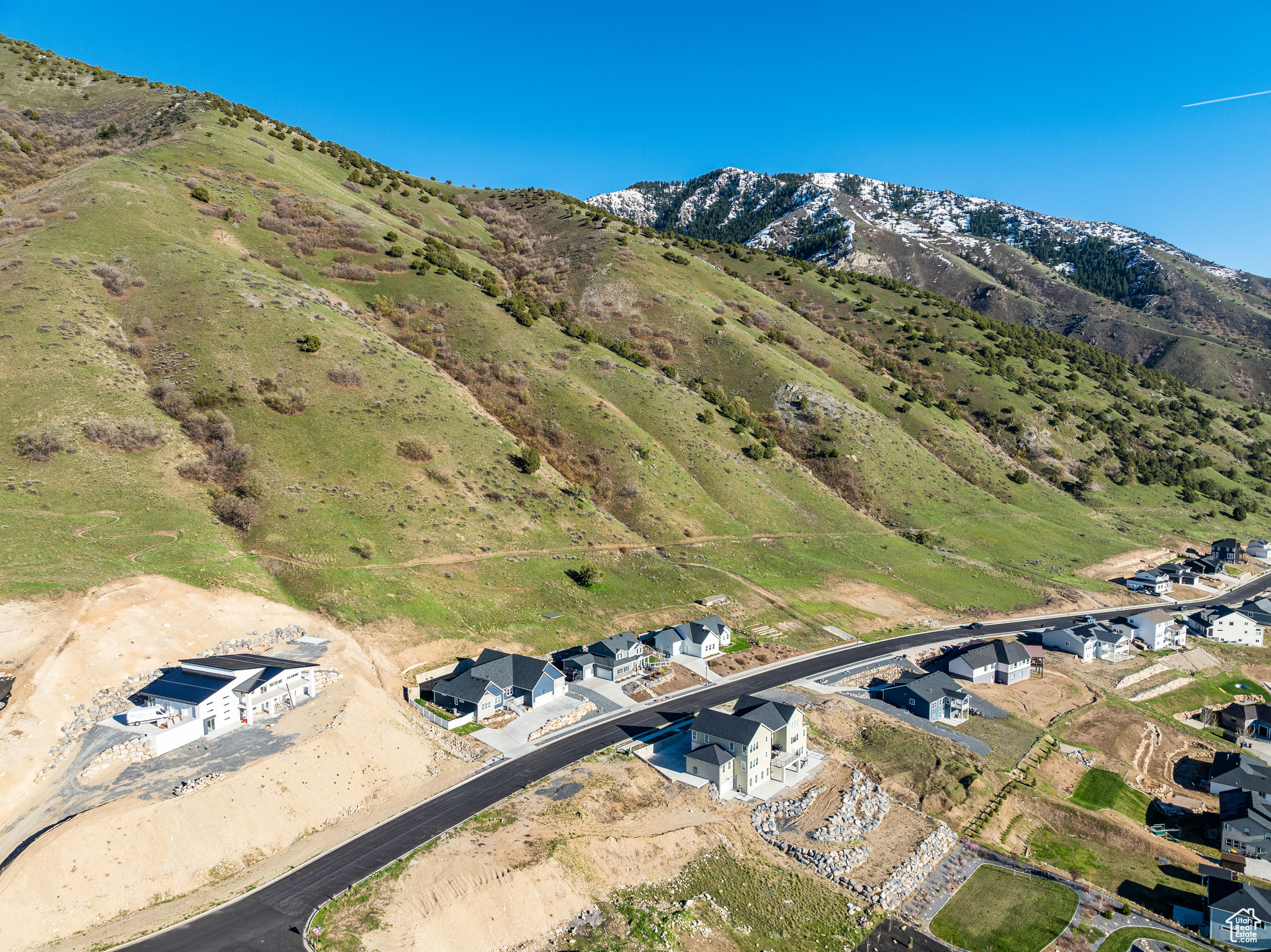 Birds eye view of property with a mountain view