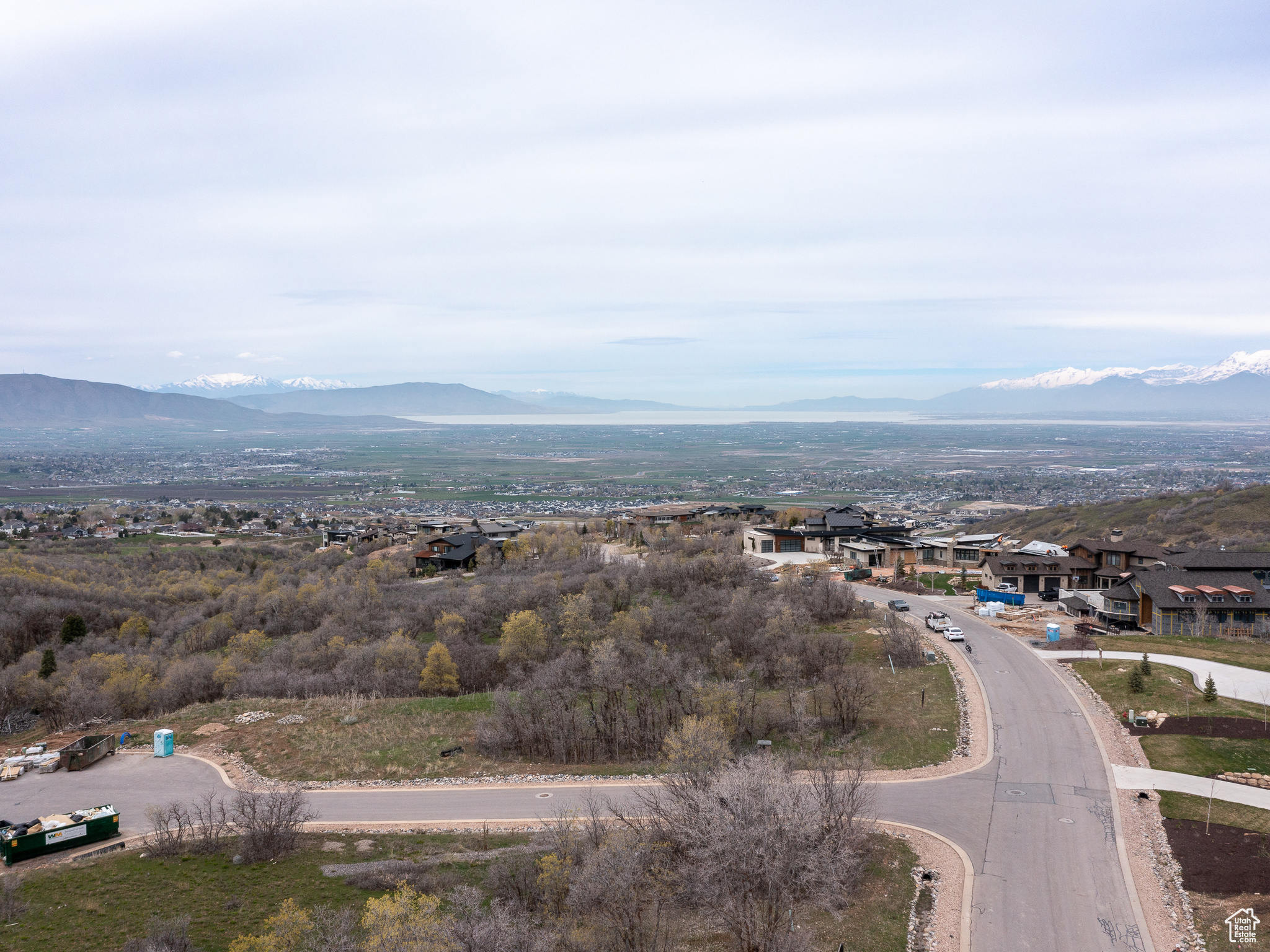 Birds eye view of property with a mountain view