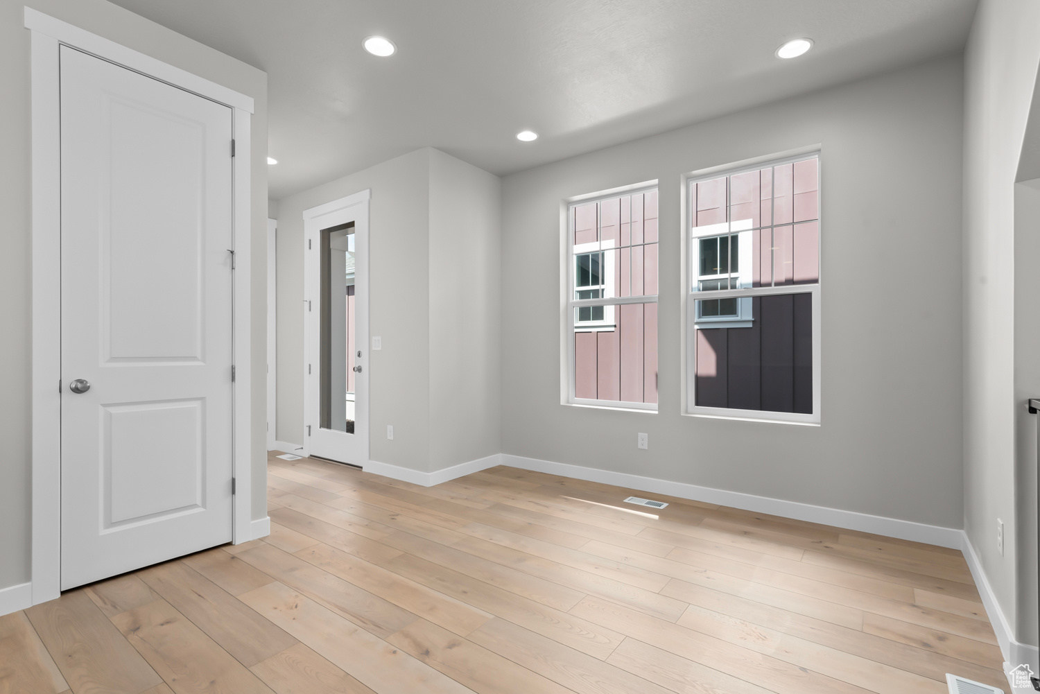 Spare room with light hardwood / wood-style floors