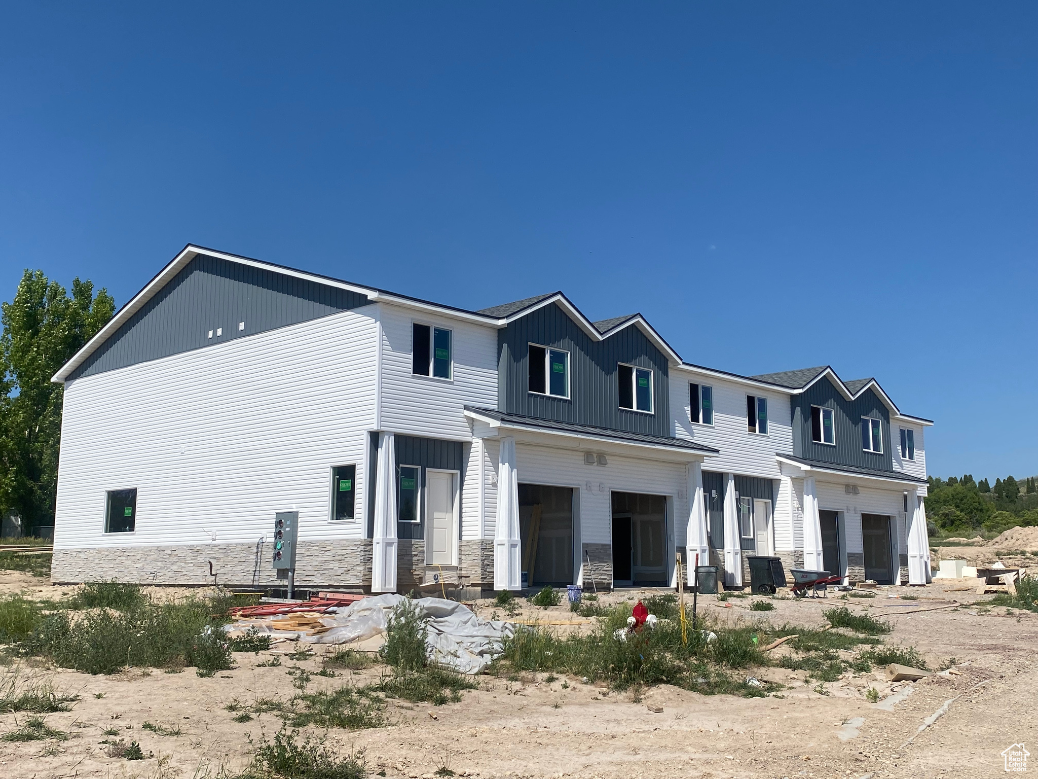 View of front of property featuring a garage