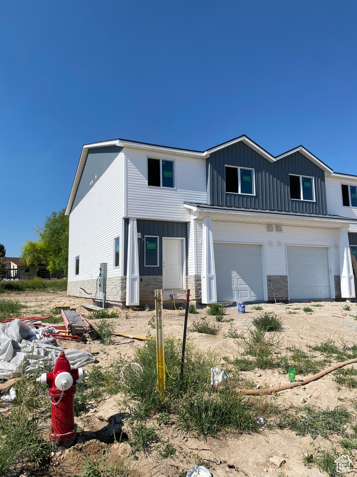 View of front of property featuring a garage