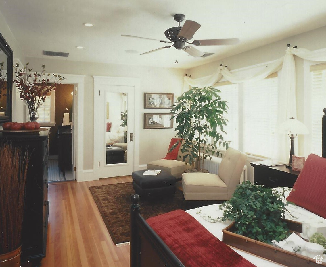 2002 Parade of Homes photo - primary suite, original hardwood floor - example only