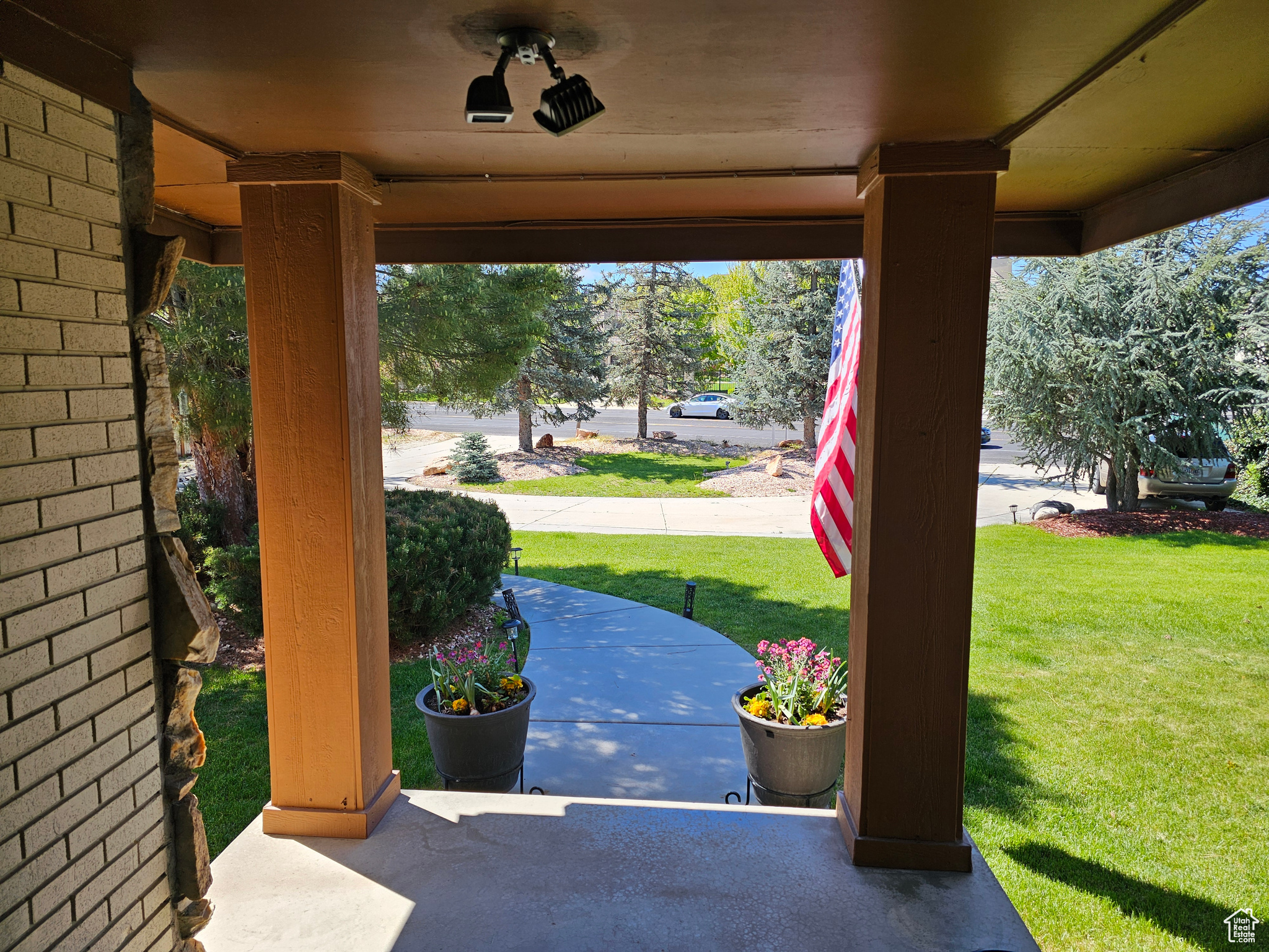 View of patio featuring ceiling fan