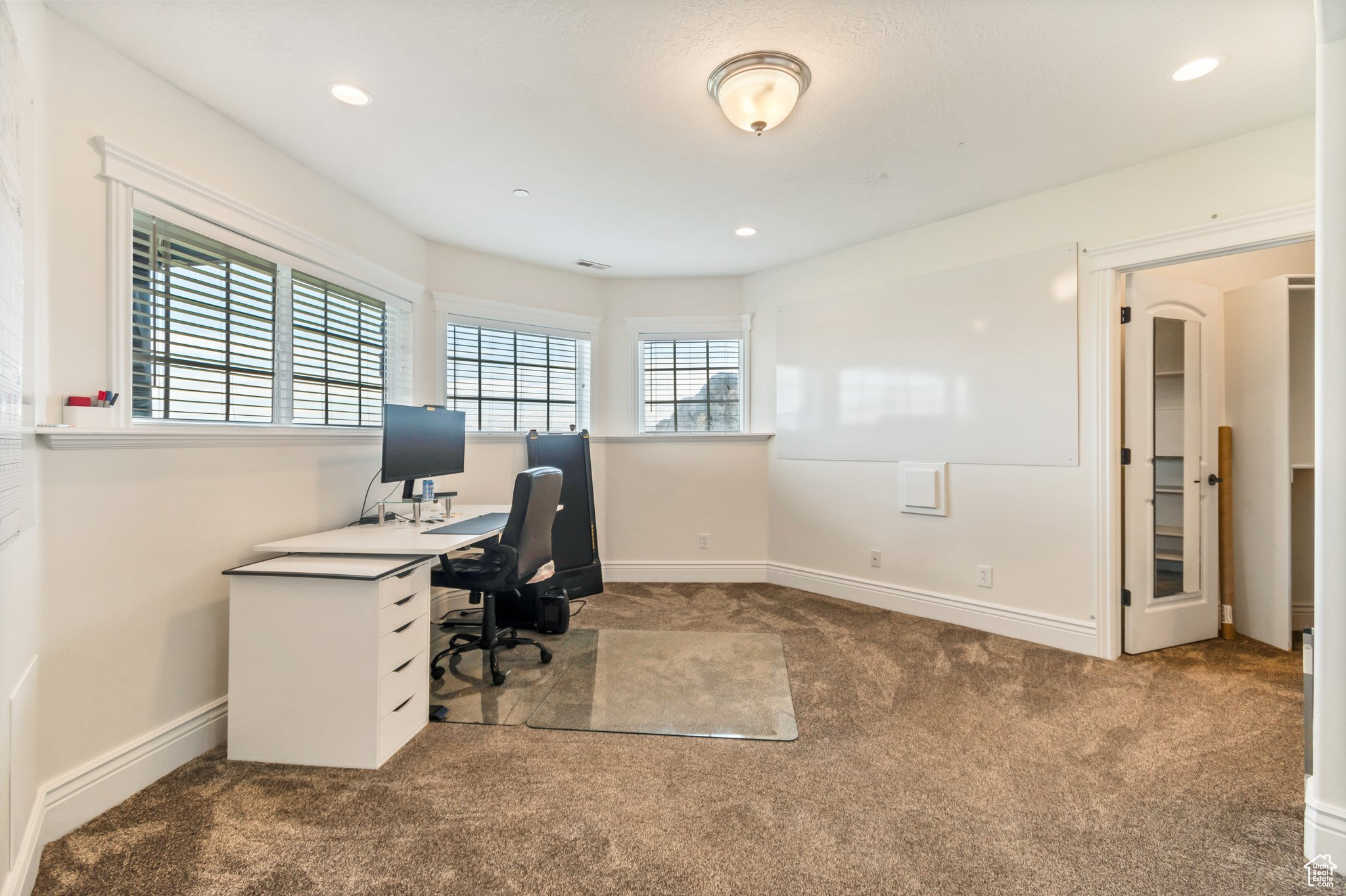 Office with carpet flooring