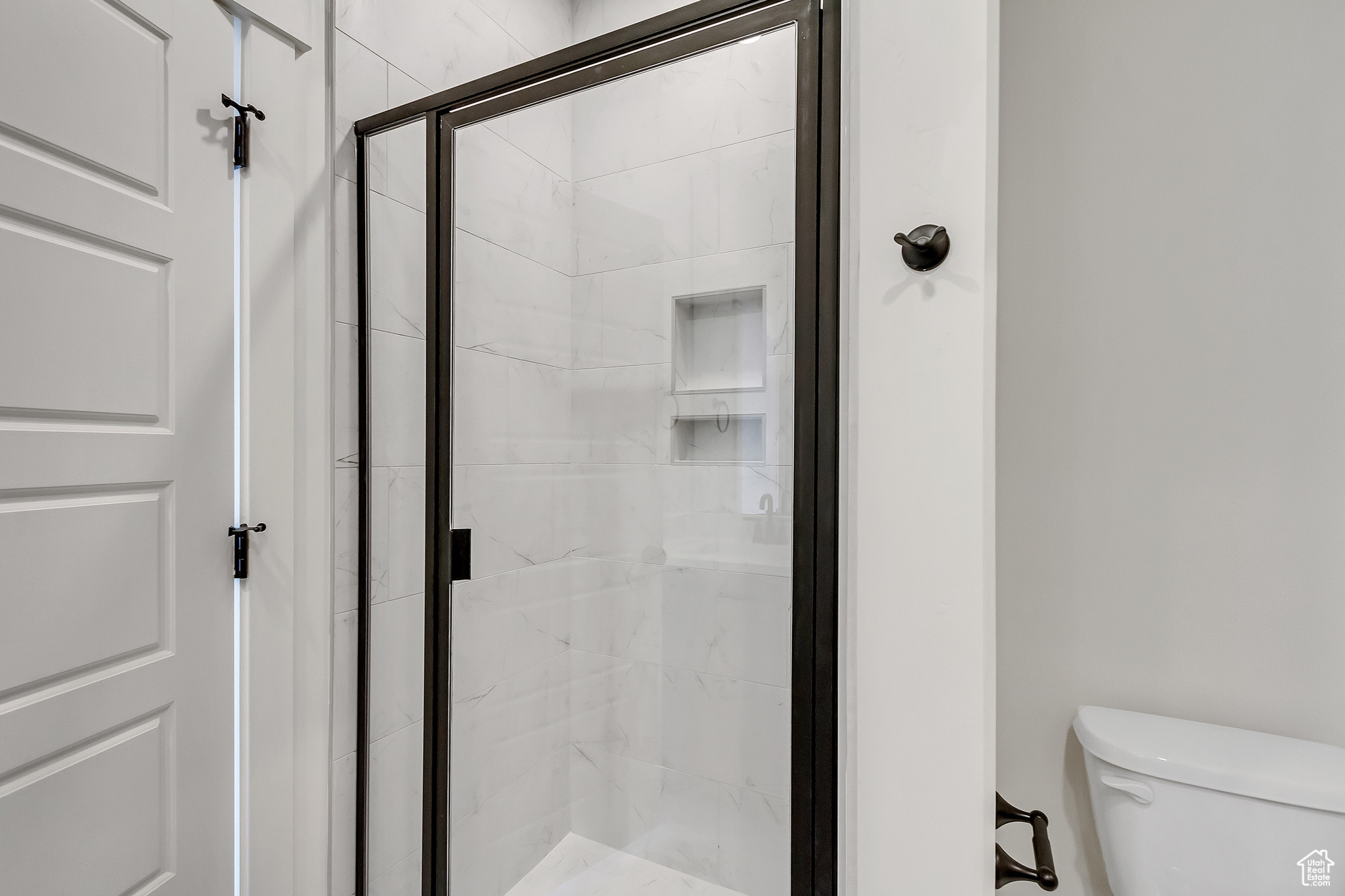 Bathroom with walk in shower and toilet