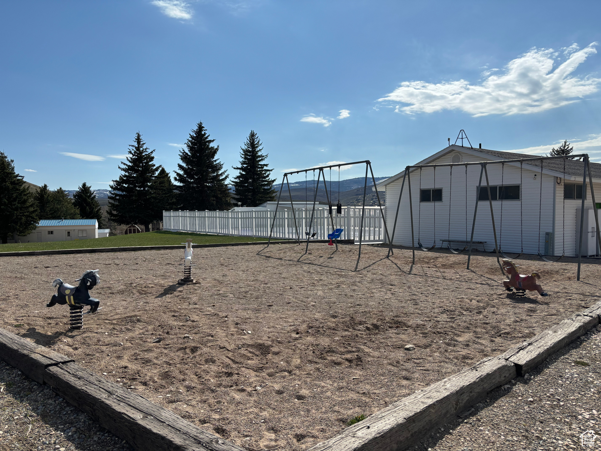 Playground and grassy area right by community pool!  The kids will enjoy hours of fun here!!!