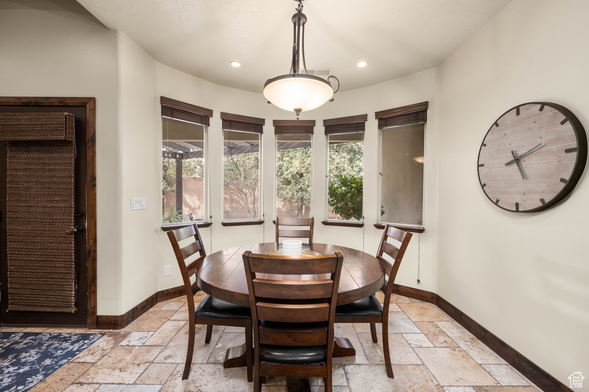 Dining room with light tile floors
