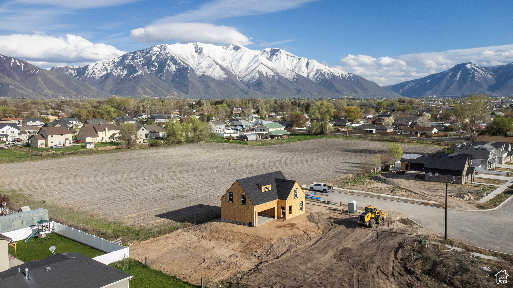 Birds eye view of property and panoramic mountain views